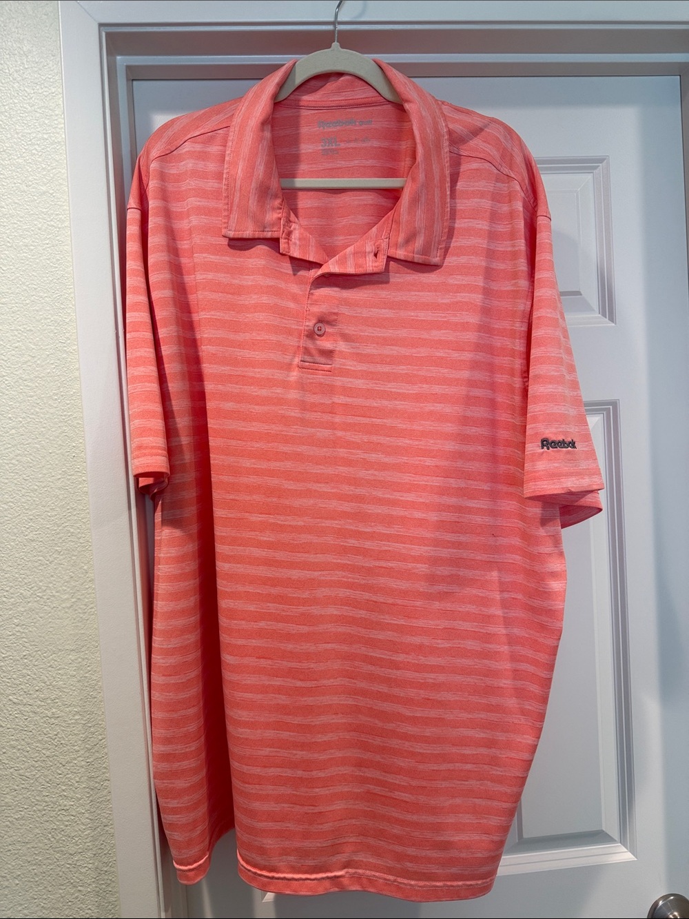 Reebok Men’s Coral Striped Polo